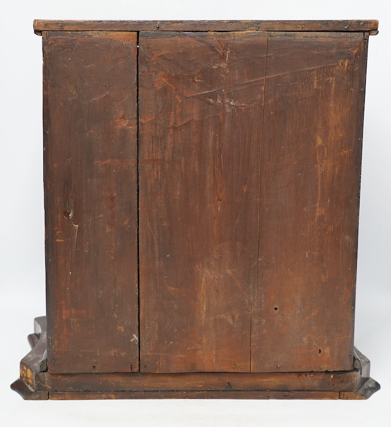 A Victorian mahogany miniature chest, on shaped plinth, 50cm wide, 49cm high. Condition - fair